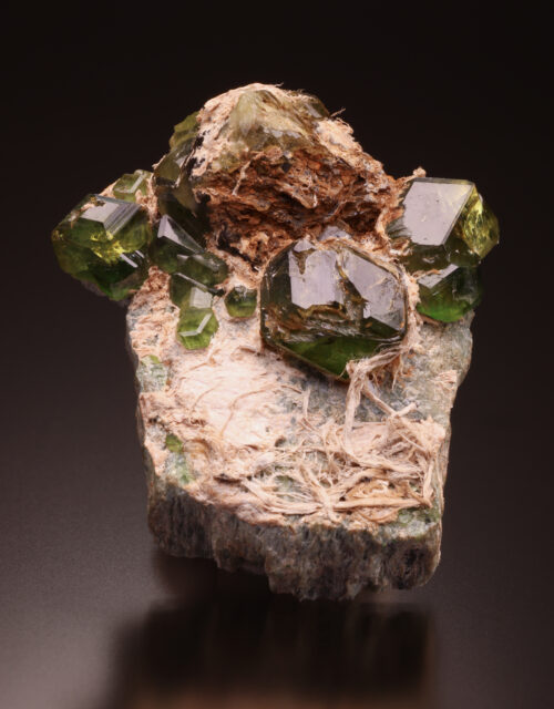 Andradite var. Demantoid, Asbestos: Dossi mines, Val Malenco, Lombardy, Italy 