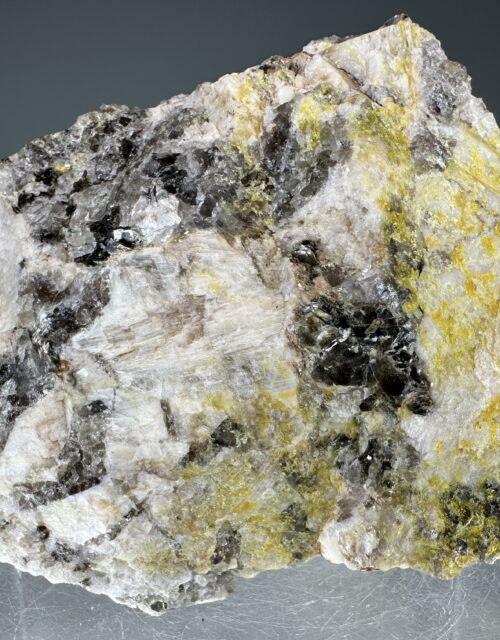 Uranophane: Chalk Mountain mine, Spruce Pine, Mitchell County, North Carolina, USA