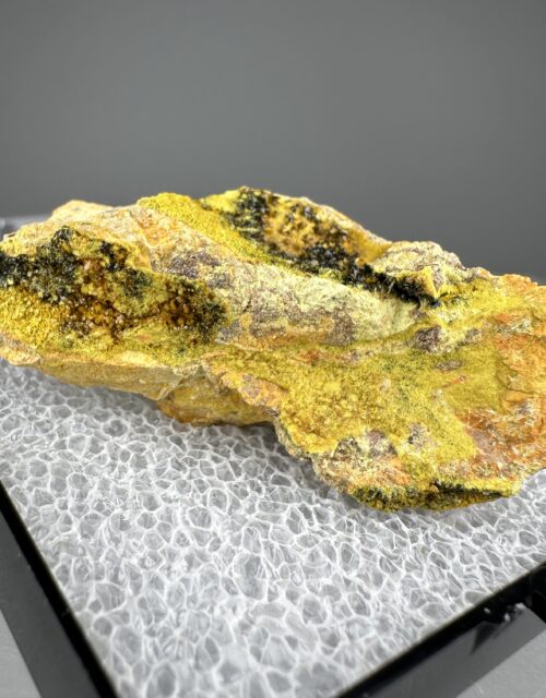 Soddyite, Curite, Swamboite-(Nd)